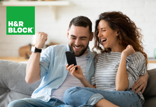 couple cheering while looking at cell phone, H&R Block logo