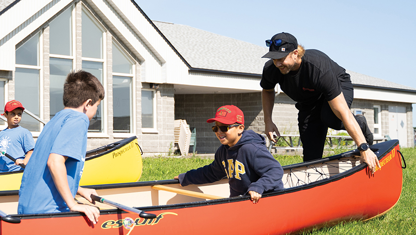 CFMWS employee at beach