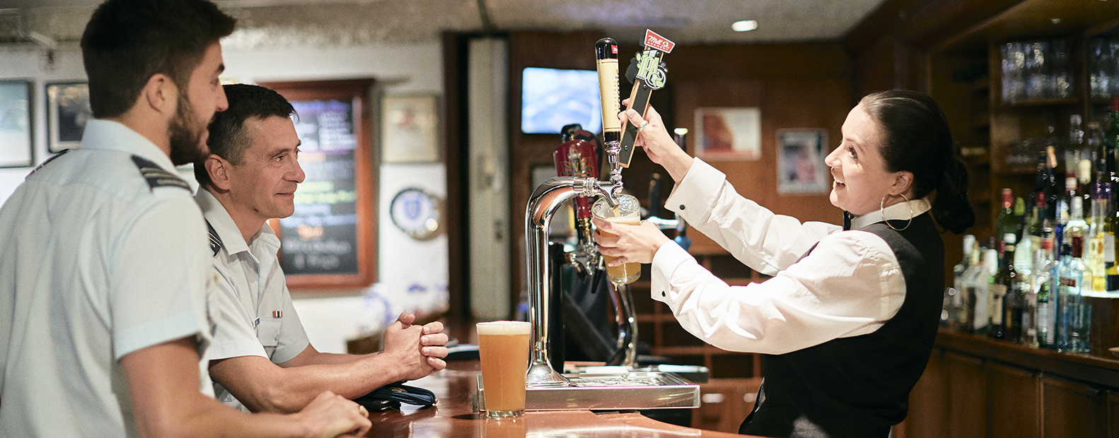 military members at mess bar