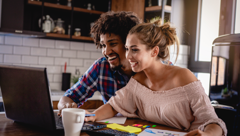 man and woman on laptop