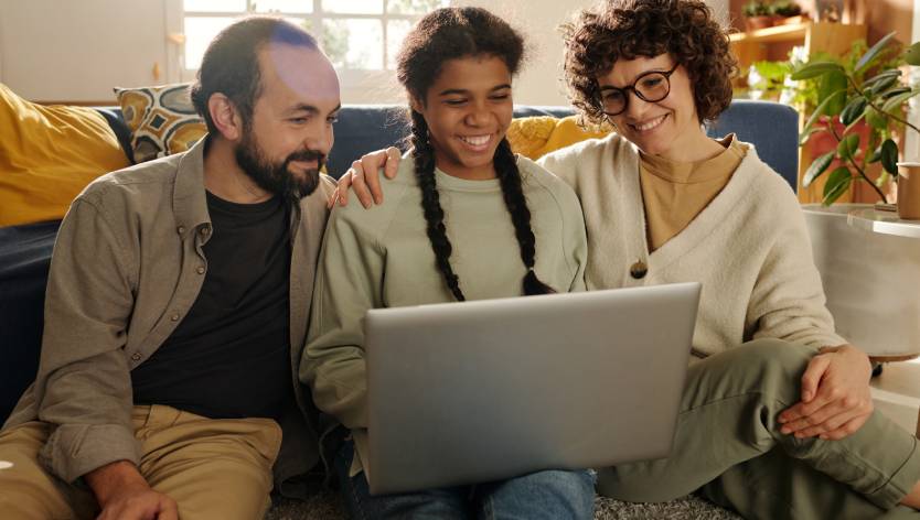 Family and child on couch