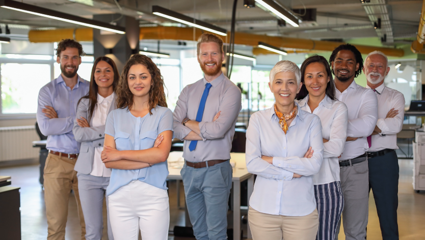 Group of men and women in  the workplace
