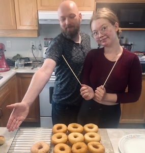 Amber and her dad baking in the kitchen