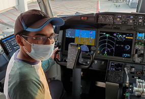 Tristan in an airplane cockpit