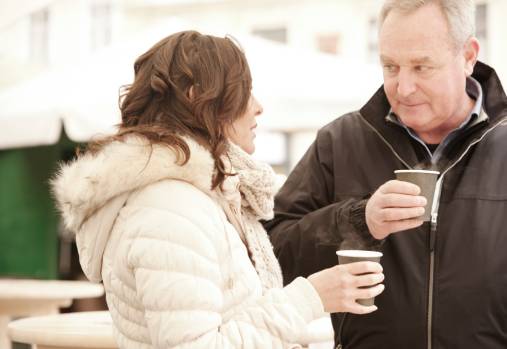 CAF member and wife holding coffee mugs