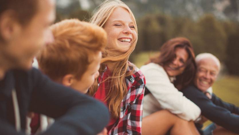 little girl smiling outside