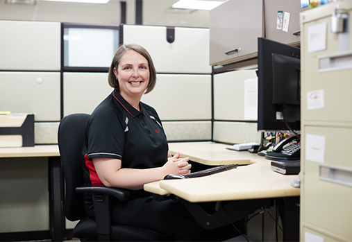employee sitting at desk