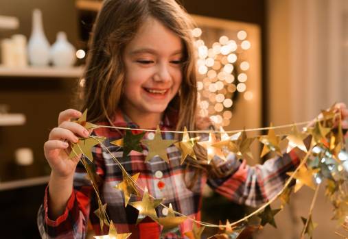 Young girl with golden stars 