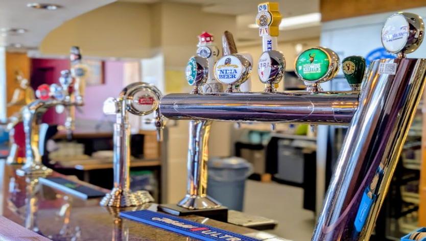 A picture highlighting some of the bar taps for the Annapolis Mess. 