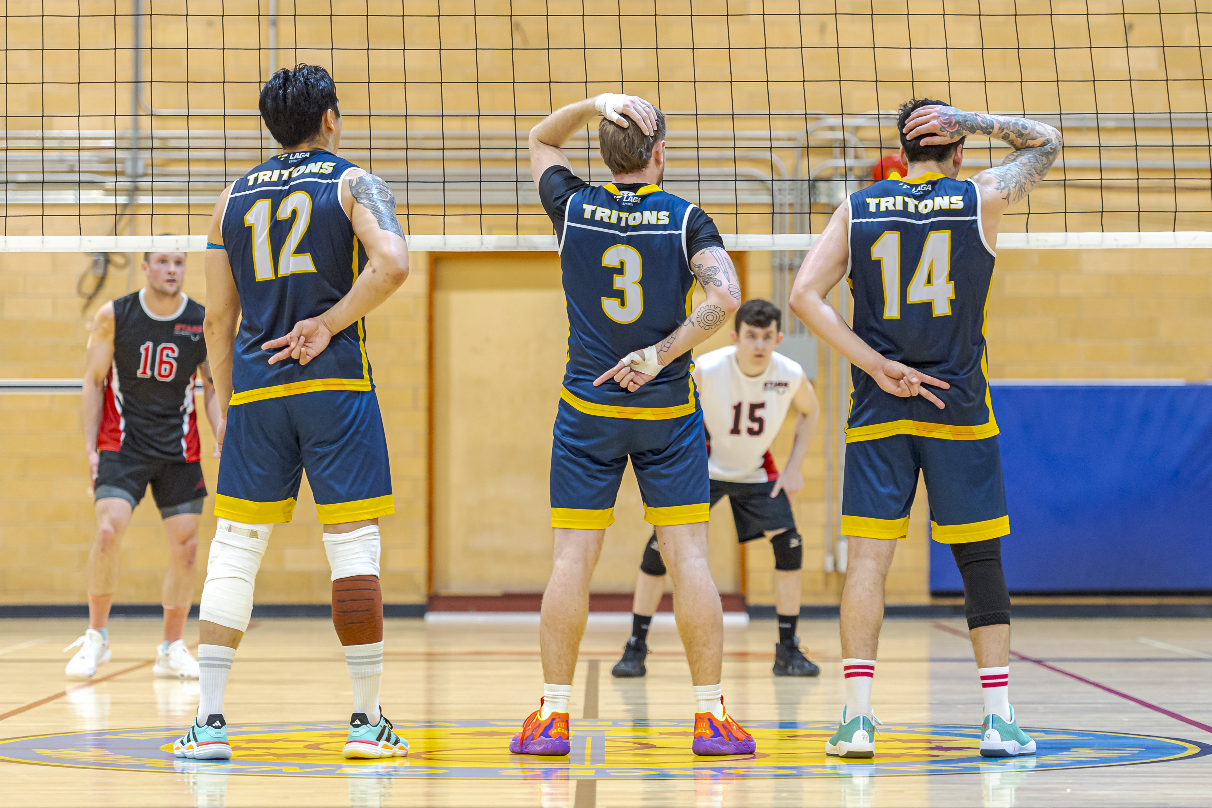 man holding volleyball