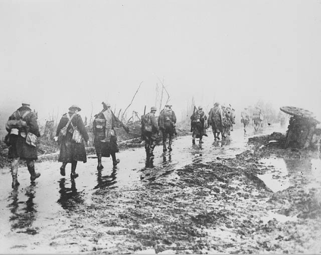 Soldiers walking down road