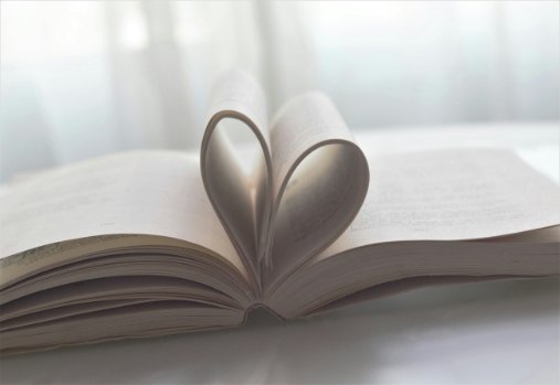 Pages of a book folded into a heart