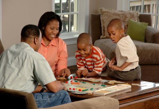 Family playing a board game